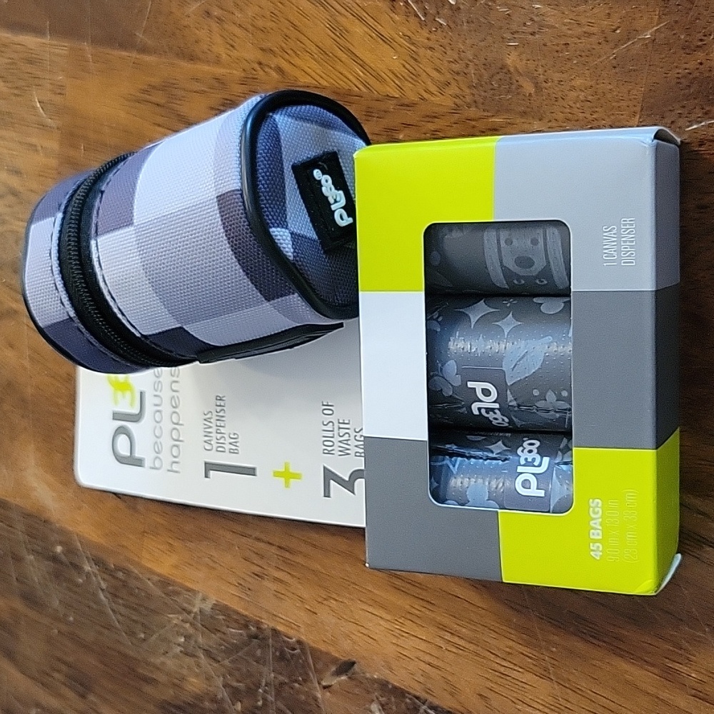 Canvas dispenser bag and 3 rolls waste bag refills